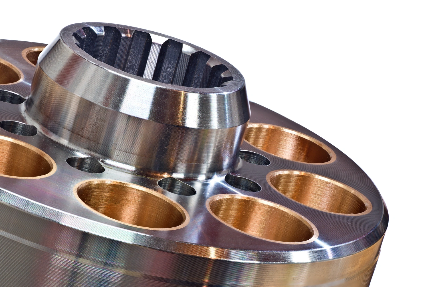 Close-up of a polished metal component featuring intricate holes and a textured interior, showcasing engineering precision and design. Close-up of a polished metal component featuring intricate holes and a textured interior, showcasing engineering precision and design.